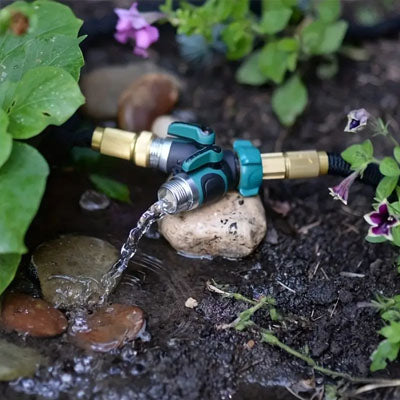 Raccord_tuyau_arrosage_-_terre